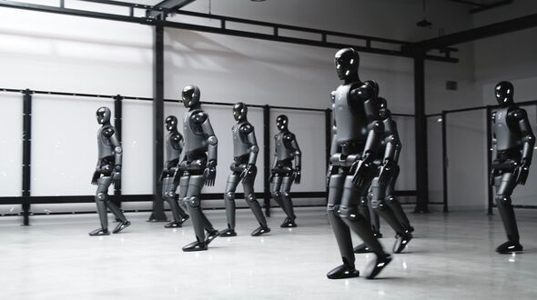Eerie video shows robot 'army' marching after AI teaches them to walk like humans